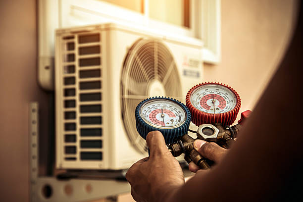 Professional Hvac technician working in Essex Fells, NJ